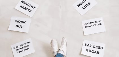 Inspirational health and fitness messages with shoe-clad feet, promoting healthy habits and wellbeing.